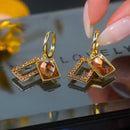 Brincos Feminino -  Zircão geométrico Banhado a Ouro