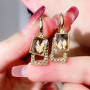 Brincos Feminino -  Zircão geométrico Banhado a Ouro